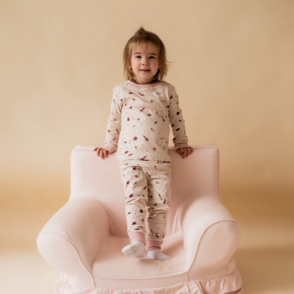 Toddler wearing space-themed pyjamas — The Bondar STEM sleepwear