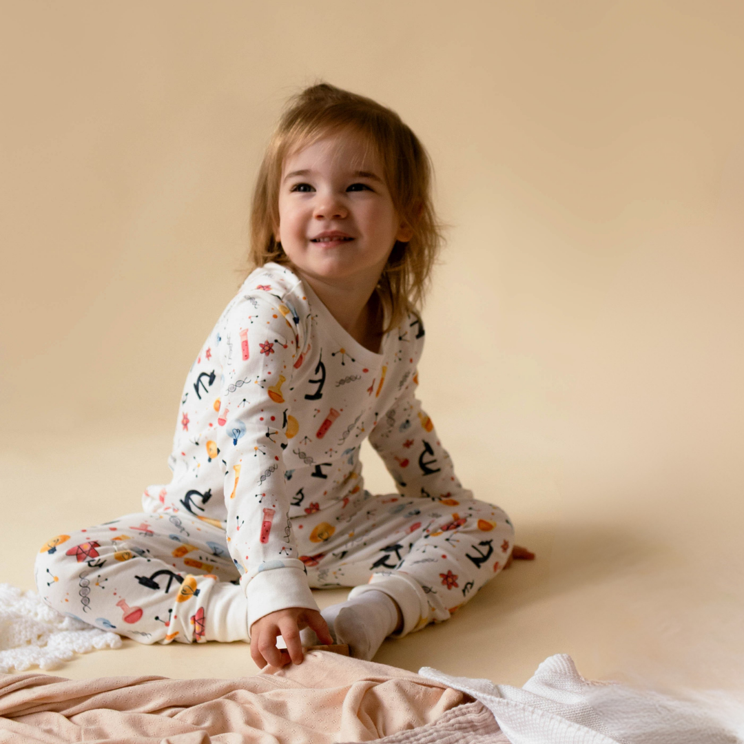 Genetics toddler pyjamas flat lay — organic cotton two-piece set