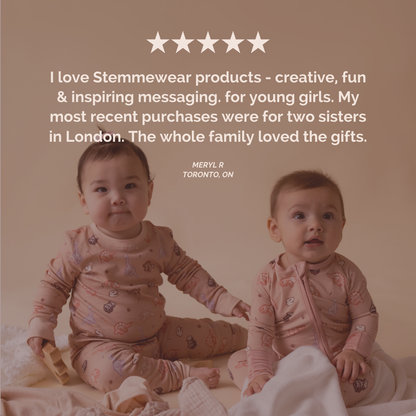 Dinosaur toddler pyjamas fabric detail — premium organic cotton