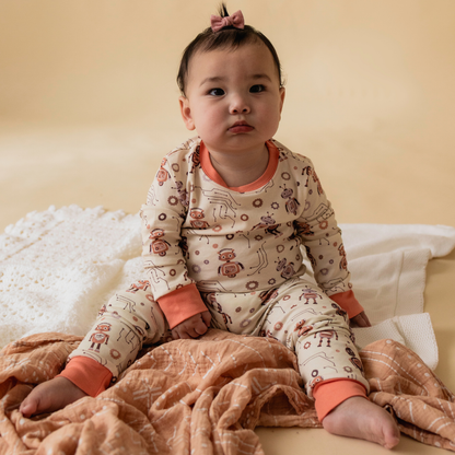 Robot toddler pyjamas pattern detail — tech-inspired print design